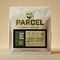White kraft coffee bag from Parcel Torrefaction featuring Ethiopia Magarrissa Sede natural process heirloom beans with citrus red fruits black tea tasting notes roasted in Normandy